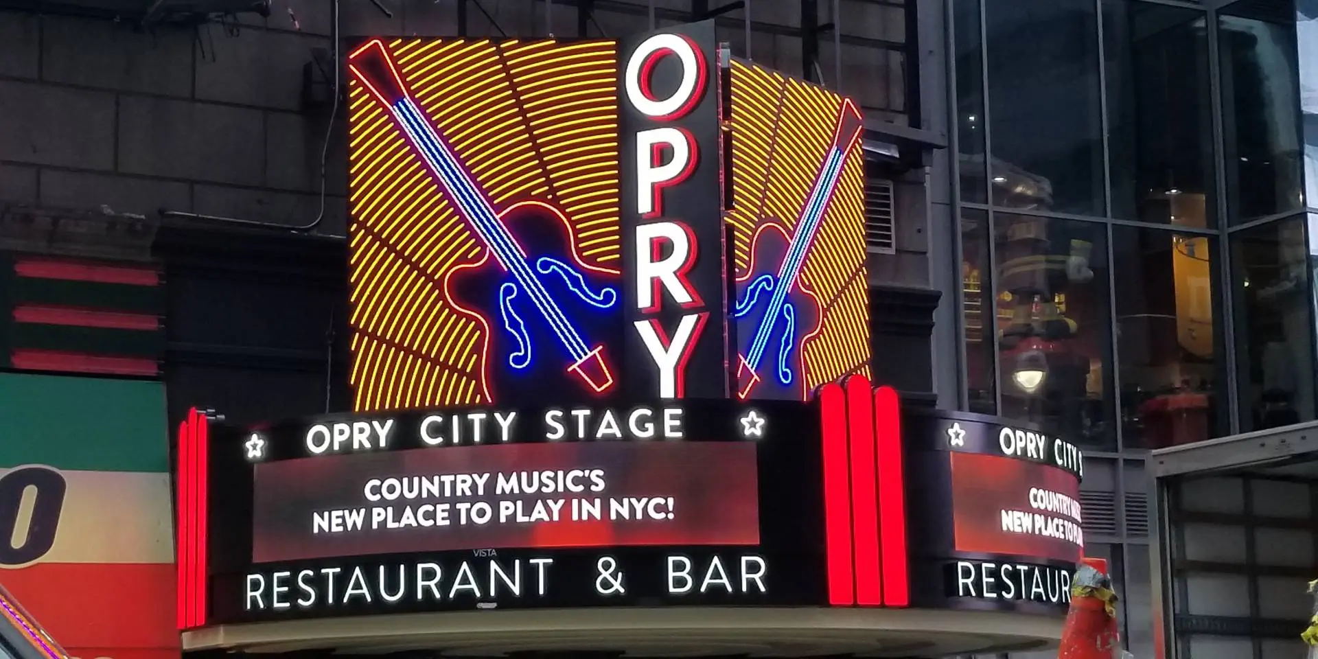 A neon sign for the opry in new york city.