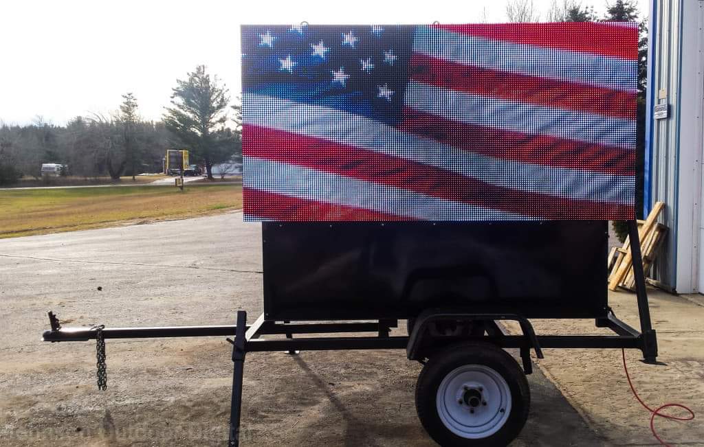 A trailer with an american flag on it