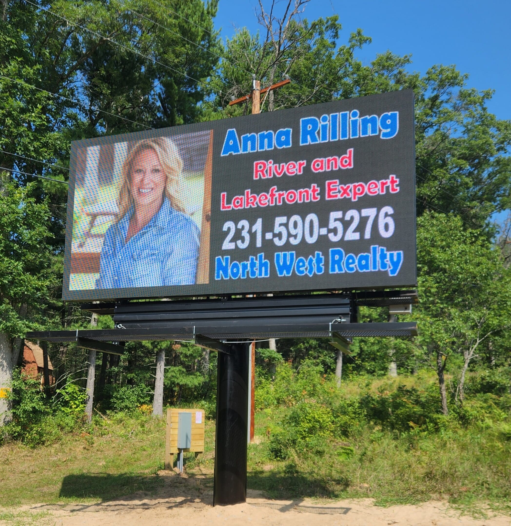 A billboard with a picture of a woman on it.